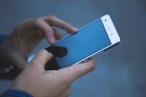 Desk lamps wirelessly charging smartphones