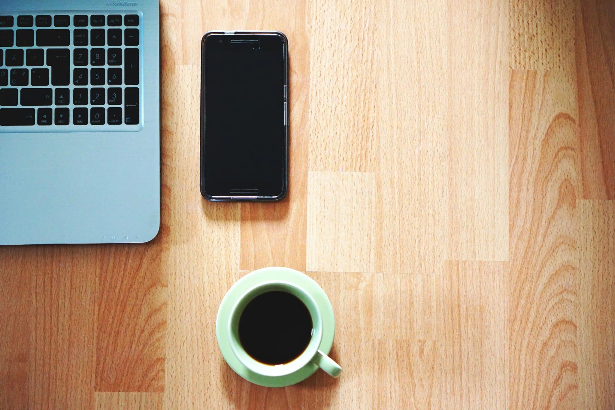Desk organizers wirelessly charging devices